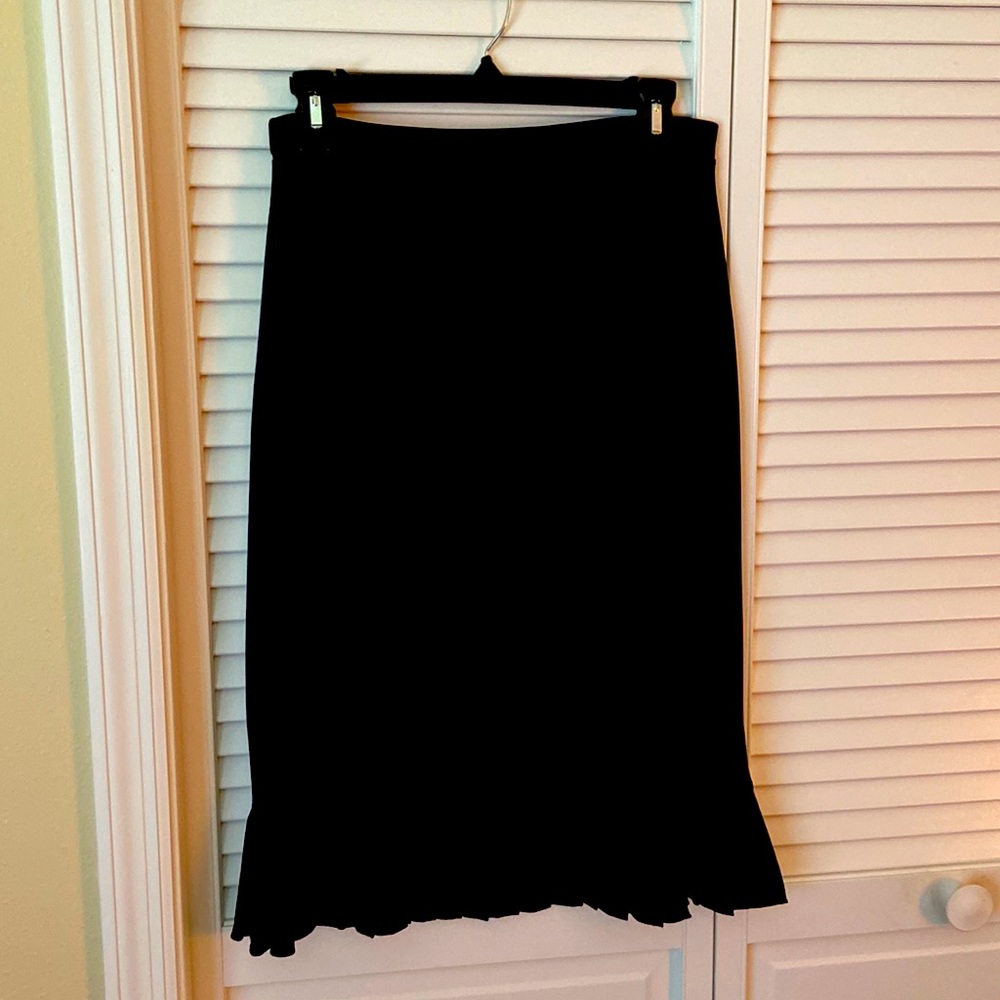 New beautiful polyester/spandex skirt With elastic waist line.